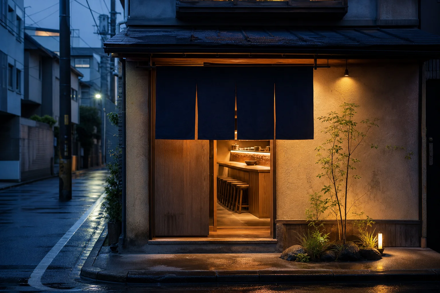 夕暮れに明かりが灯る麺処 暁の店舗外観イメージ